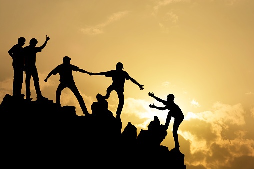 Group of people on mountain peak